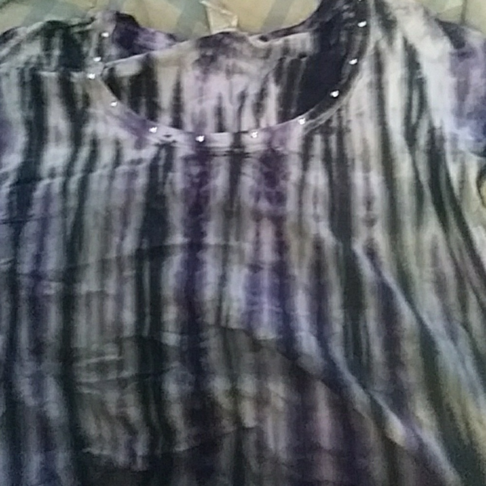 A black, white ,and purple galaxy tee shirt